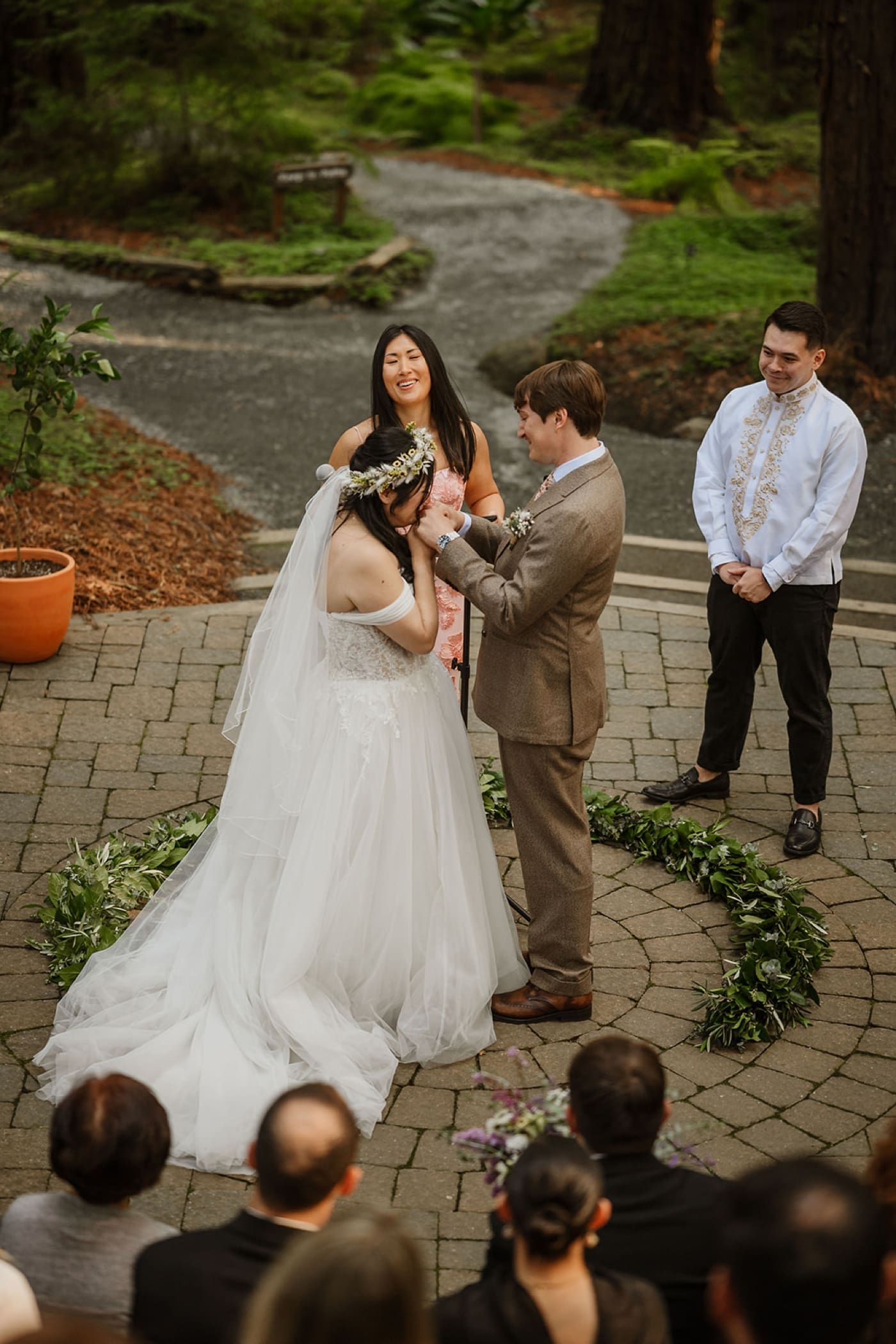Wedding ceremony in the redwood grove at the UC Botanical Garden