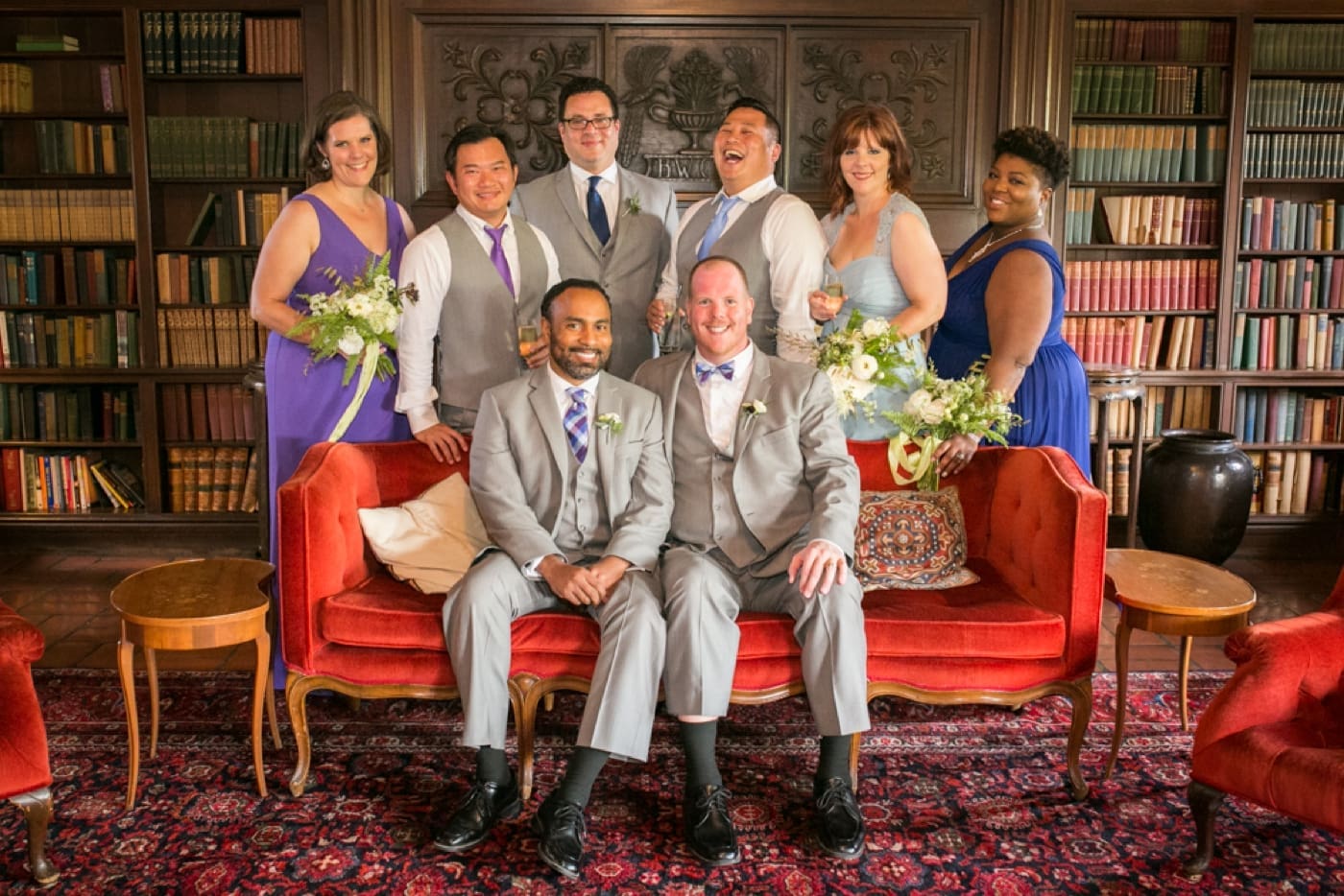 Wedding party portrait in a library
